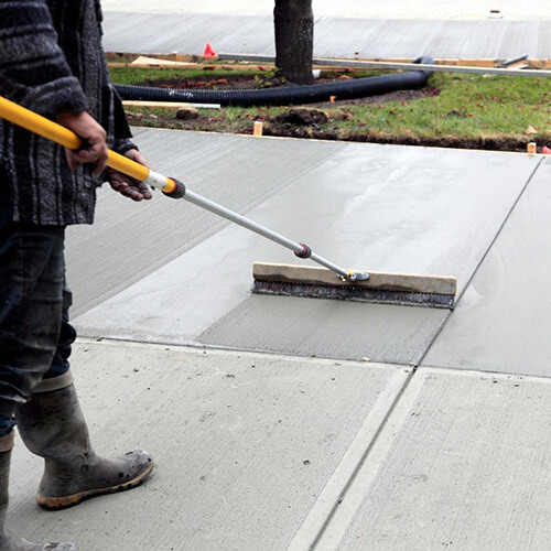 Concrete slab poured over helical piers